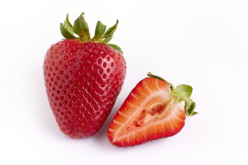 strawberry and half of a strawberry
